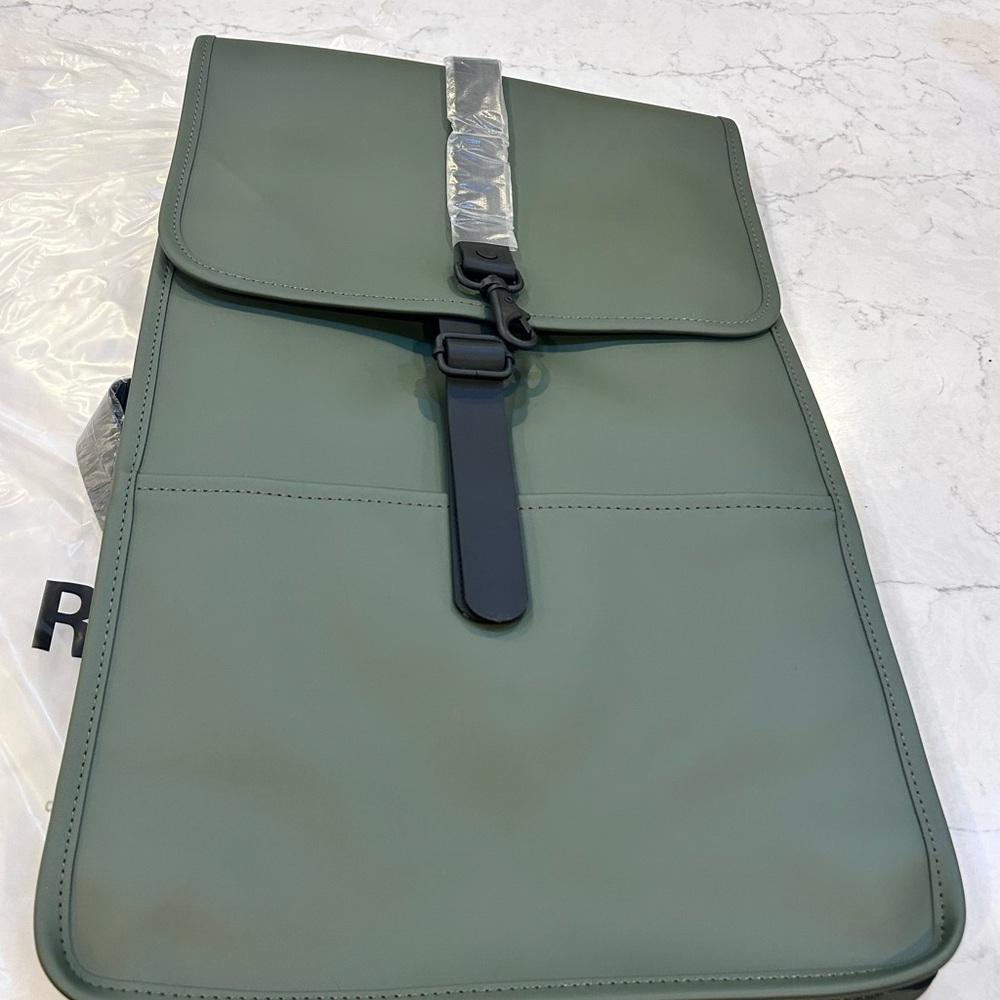 NET RAINS $125 Green Backpack with Black Accents